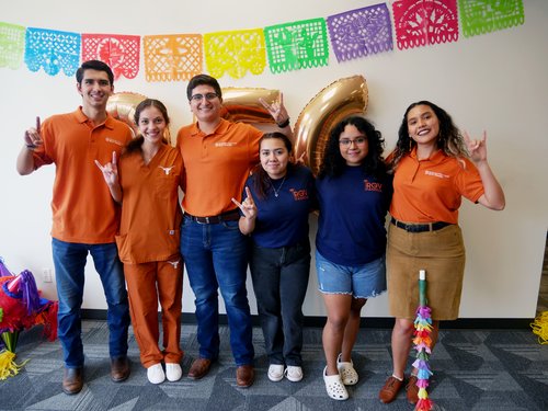 RGV familia members posing for photo at the 2022 welcome event